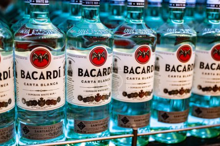 Photo for DUBAI, UAE - MAR 22, 2022: Bottles of Bacardi rum on a store shelf - Royalty Free Image