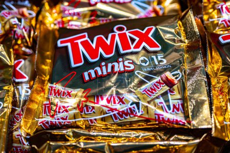 Photo for MUSCAT, OMAN - MAR 14, 2024: Packages of Twix, a brand name of confectionery products made by the American company Mars - Royalty Free Image