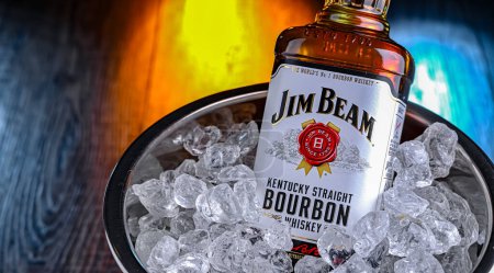 Photo for POZNAN, POL - FEB 28, 2024: Bottle of Jim Beam, one of best selling brands of bourbon in the world, produced by Beam Inc. in Clermont, Kentucky - Royalty Free Image