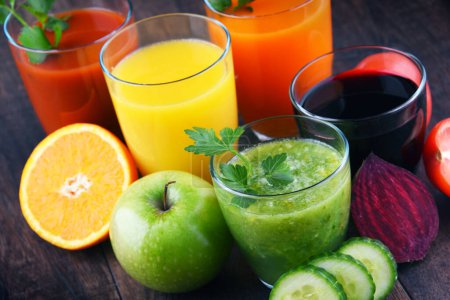 Photo for Glasses with fresh organic vegetable and fruit juices. Detox diet - Royalty Free Image