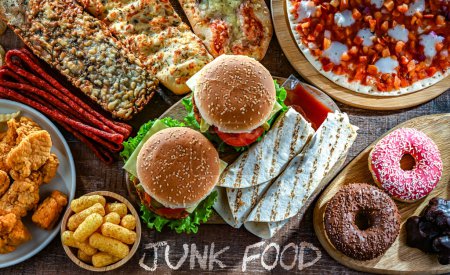 Foto de Foods enhancing the risk of cancer. Junk food. - Imagen libre de derechos