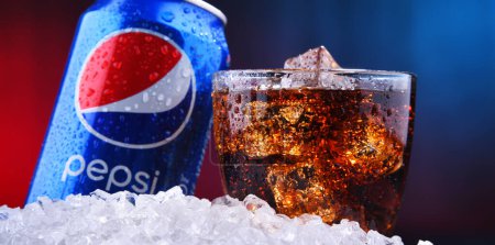Photo for POZNAN, POL - AUG 13, 2019: A can and a glass of Pepsi, a carbonated soft drink produced and manufactured by PepsiCo. The beverage was created and developed in 1893 under the name Brad's Drink - Royalty Free Image