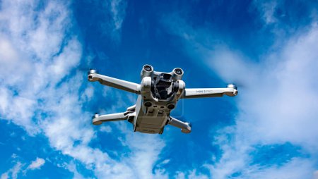 Photo for POZNAN, POL - APR 29, 2024: Drone DJI Mini 3 PRO during flight - Royalty Free Image