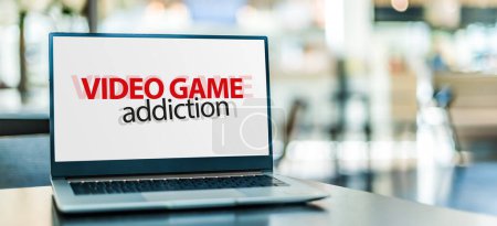 Laptop computer displaying the sign of video game addiction