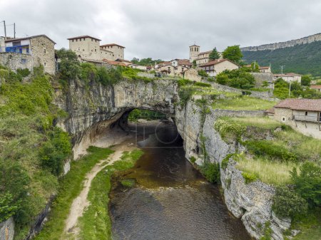 Photo for Beautiful view of Puentedey, a picturesque village with a natural bridge over the river. Merindades, Burgos, Spain, One of the Beautiful Towns - Royalty Free Image