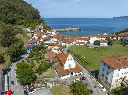 Photo for Aerial view Church of Iglesia San Miguel in Tazones Asturias Spain. named beautiful town of Spain - Royalty Free Image