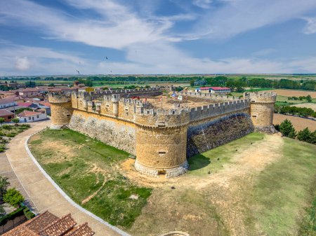 Photo for Castle of Grajal de Campos in Leon. Witness of centuries of history, stone walls tell stories of battles and past times. An icon of medieval architecture. - Royalty Free Image