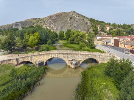 Photo for Osma province of Soria, aerial view of the Roman bridge. Spain - Royalty Free Image
