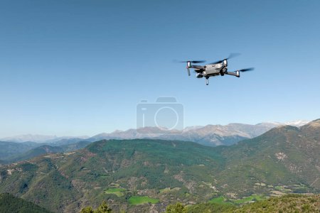 Photo for Free flight of a UAS Drone in the background of the Catalan Pyrenees mountains in Spain - Royalty Free Image