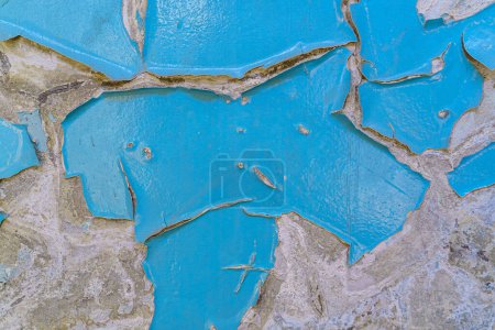 Foto de Pintura pelada en textura de pared. Patrón de material grunge azul rústico. - Imagen libre de derechos