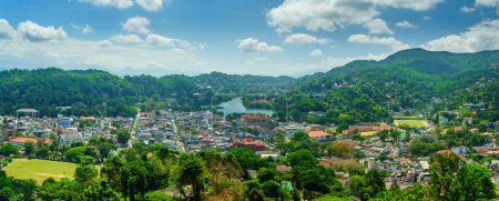 Photo for Panorama of the city among the green hills. Kandy city in Sri Lanka. - Royalty Free Image
