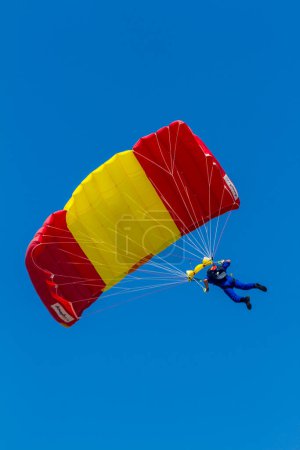 Photo for MOTRIL, GRANADA, SPAIN-JUN 11: Parachutist of the PAPEA taking part in an exhibition on the 12th international airshow of Motril on Jun 11, 2017, in Motril, Granada, Spain - Royalty Free Image
