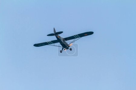 Photo for MOTRIL, GRANADA,  SPAIN-JUN 26: Aircraft Piper  J3 - Cristina Echevarria taking part in an exhibition on the 11th airshow of Motril on June 26, 2016, in Motril, Granada, Spain - Royalty Free Image