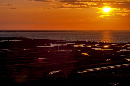 Photo for Fantastic sunset on the beach of Cortadura on Cadiz, Spain - Royalty Free Image