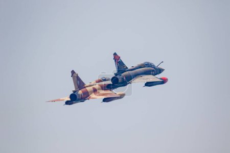 Photo for TORRE DEL MAR, MALAGA, SPAIN-JUL 28: Aircraft Mirage 2000 of the Couteau Delta Tactical Display  taking part in a exhibition on the 2nd airshow of Torre del Mar on July 28, 2017, in Torre del Mar, Malaga, Spain - Royalty Free Image