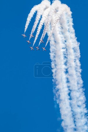 Photo for TORRE DEL MAR, MALAGA, SPAIN-JUL 29: Aircraft CASA C-101 of the Patrulla Aguila taking part in a exhibition on the 3rd airshow of Torre del Mar on July 29, 2018, in Torre del Mar, Malaga, Spain - Royalty Free Image