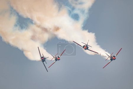 Photo for MOTRIL, GRANADA, SPAIN-JUN 28: Aircraft CASA C-101 of the Patrulla Aguila taking part in a exhibition on the 14th airshow of Torre del Mar on June 28, 2019, in Motril, Granada, Spain - Royalty Free Image