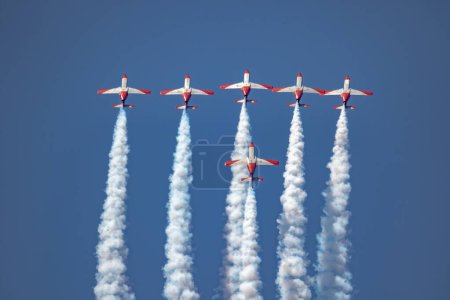 Photo for MOTRIL, GRANADA, SPAIN-JUN 28: Aircraft CASA C-101 of the Patrulla Aguila taking part in a exhibition on the 14th airshow of Torre del Mar on June 28, 2019, in Motril, Granada, Spain - Royalty Free Image