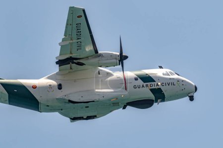 Photo for TORRE DEL MAR, MALAGA, SPAIN-JUL 14:  Aircraft CASA C-235 of Guardia Civil taking part in a exhibition on the 4th airshow of Torre del Mar on July 14, 2019, in Torre del Mar, Malaga, Spain - Royalty Free Image