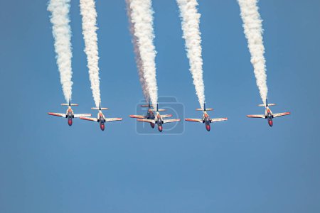 Photo for MOTRIL, GRANADA, SPAIN-JUN 30: Aircraft CASA C-101 of the Patrulla Aguila taking part in a exhibition on the 14th airshow of Torre del Mar on June 30, 2019, in Motril, Granada, Spain - Royalty Free Image