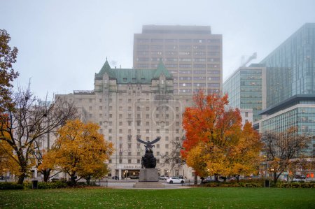 Photo for Ottawa, Ontario - October 19, 2022: View of the Lord Elgin Hotel from Confederation Park on a foggy morning. - Royalty Free Image