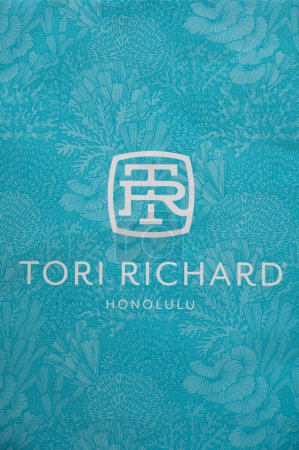 Téléchargez les photos : Calgary, Alberta - January 3, 2023: Tori Richard Honolulu brand on blue flower background, - en image libre de droit
