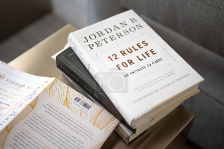 Photo for Calgary, Alberta - February 16, 2024: Cover of Jordan Peterson's book - 12 Rules for Life, an Antidote to Chaos. - Royalty Free Image