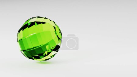 Foto de Una bola verde está girando en círculos sobre una mesa blanca, asemejándose a un pisapapeles en un escritorio. Se parece a un líquido dentro de un vaso, con reflejos como gafas de vista o gafas de sol - Imagen libre de derechos
