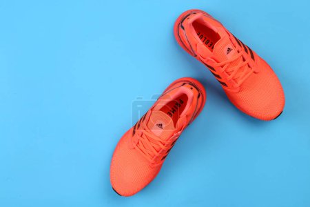 Photo for Jeddah Saudi Arabia July 22 2020 : Pair of sport shoes on colorful background. - Royalty Free Image