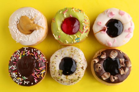 Photo for Assorted donuts with  sprinkles - Royalty Free Image