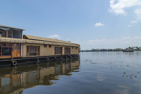 Photo for House boat under blue sky from Alleppey or AlappuzhaKerala.Kerala Backwaters, houseboat Photo - Royalty Free Image