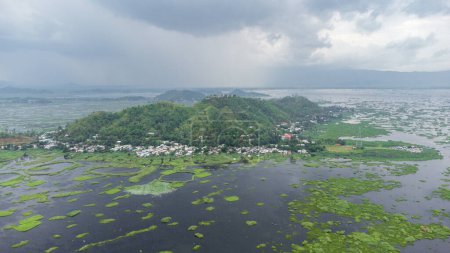 Photo for Aerial view loktak lake is the largest freshwater lake and thanga village in India as well as the largest lake in North East India. - Royalty Free Image