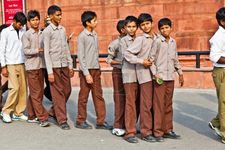 Photo for Delhi, India - November 9, 2011: scholars in uniform visit the Red Fort in Delhi, India. Schools uniforms are compulsory in India, from primary to higher-secondary level. - Royalty Free Image