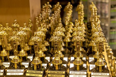 Photo for Los Angeles, USA - March 17, 2019: small Oscars in artifical gold for tourists in a souvenir shop. - Royalty Free Image