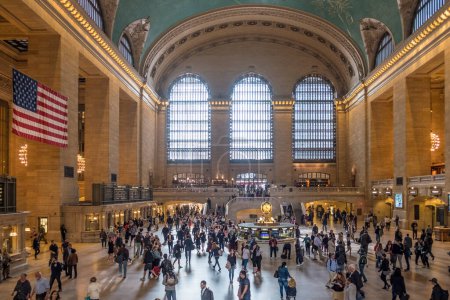 Photo for NEW YORK, USA - OCT 4, 2017: People move along the Interior of the main concourse at historic Grand Central Terminal. - Royalty Free Image