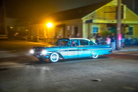 Photo for OLD ORCHARD BEACH, USA - SEP 15, 2017: Old vintage cars at the 24th Annual Old Orchard Beach Maine Car Show  drive along by night the seven miles long beach street in Old Orchard Beach. - Royalty Free Image