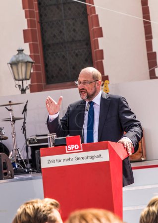 Photo for FRANKFURT, GERMANY - AUG 25, 2017: candidate for german cancellorship Martin Schulz helds a speech to his audience in Frankfurt at the Roemer place. - Royalty Free Image