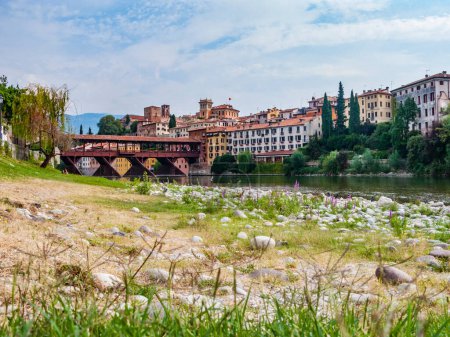 Photo for The old wooden bridge spans the river brenta at the romantic village Basano del Grappa - Royalty Free Image