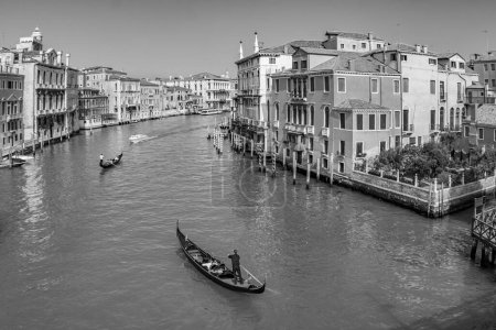 Photo for Venice, Italy - April 9, 2007: people enjoy the gondola trip in the Canale Grande in Venice, Italy. - Royalty Free Image