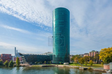 Photo for Frankfurt, Germany - October 21, 2009: Frankfurt WESTHAFEN tower at river Main in the west harbor area in afternoon light. The westhafen tower is the new symbol for the harbor area. - Royalty Free Image