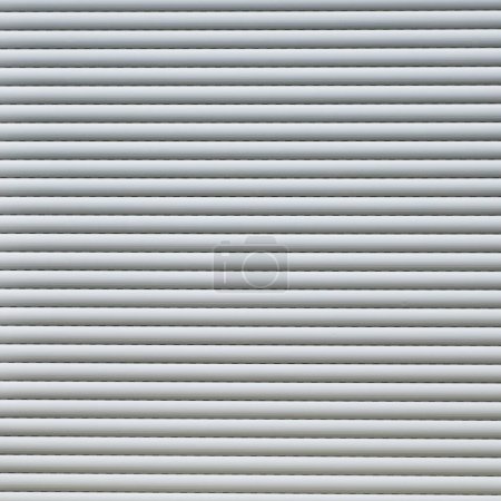 Photo for Pattern of grey metal shutter blinds in detail gives a harmonic background - Royalty Free Image