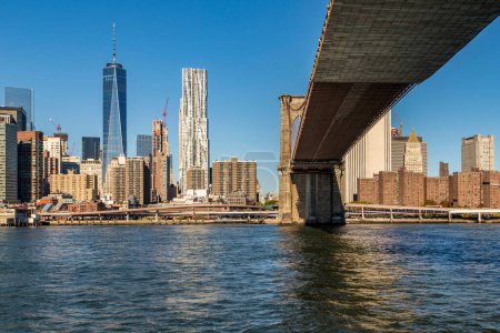 Photo for Manhattan skyline seen from Brooklyn side on a sunny day - Royalty Free Image