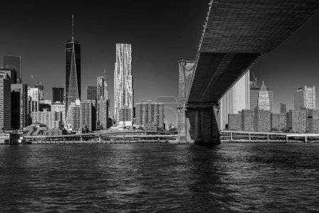 Photo for Manhattan skyline seen from Brooklyn side on a sunny day - Royalty Free Image