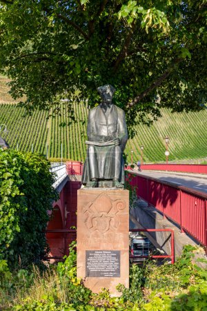 Foto de Trittenheim, Germany - July 19, 2020: statue of Johannes Trithemius, humanist, theologist and writer in medieval times. - Imagen libre de derechos