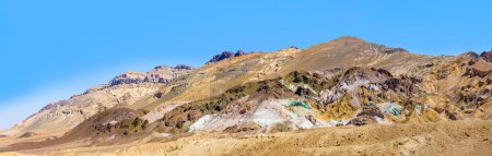 Photo for Slopes of Artists Palette in Death Valley, California. Various mineral pigments have colored the volcanic deposits found here. - Royalty Free Image