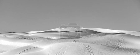 Photo for Sand dune in the desert with marks of cars - Royalty Free Image