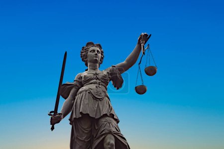 Foto de Lady justice in Frankfurt with sword and wage as symbol for Law, Justice and order - Imagen libre de derechos