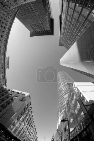 Photo for Frankfurt, Germany - February 8, 2023: fisheye perspective of skyscraper downtown financial district in Frankfurt, Germany. - Royalty Free Image