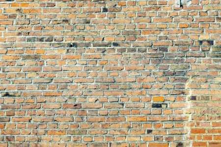 Téléchargez les photos : Pattern of harmonic yellow  brick wall   background - en image libre de droit