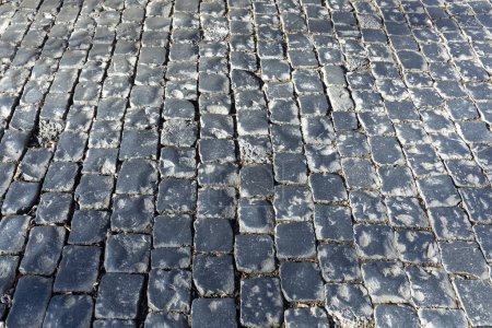 Foto de Pattern of old historic cobble stones at the street in harmonic light - Imagen libre de derechos
